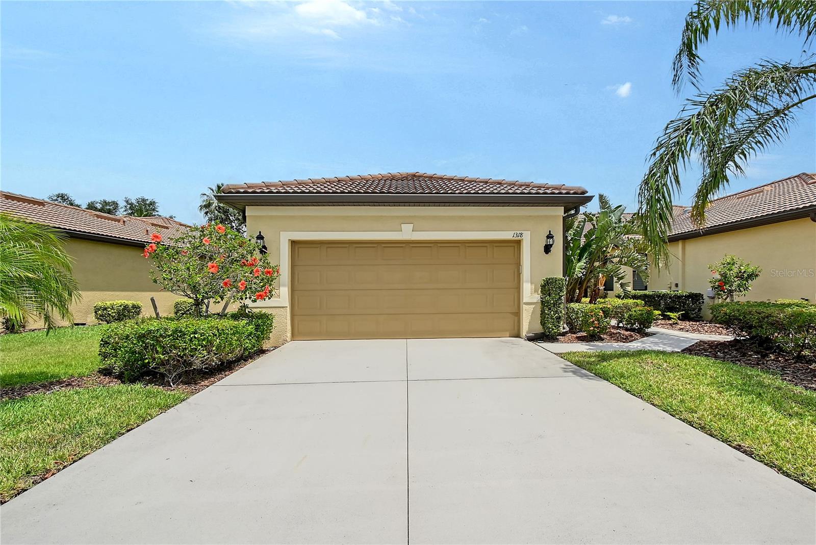 Welcome to 1318 Ballota Ln. in the sought-after 55+ gated community of Cypress Falls at the Woodlands. This bright and spacious 1582 sqft end-unit home is fully furnished. The front entry features lush landscaping. Walking into the home you will notice the kitchen with granite countertops, ample cabinets, and counter space. The open-concept living and dining areas are perfect for entertaining. The primary bedroom includes a large walk-in closet and an en-suite bath with dual sinks, upgraded tile, and a spacious shower. A versatile flex room with French doors can serve as an extra guest room, while the guest bedroom and bath ensure visitors to feel at home. When you want serenity just walk out to the fully covered lanai where you have privacy to read books, entertain or just relax. The laundry area is conveniently near the garage and finally the large 2 car garage with ample storage space. Cypress Falls also boasts a wealth of amenities, including a clubhouse, resort-style pools, a fitness center, tennis and pickleball courts, horseshoes, bocce, and plenty of social events. With a full-time activities director and a variety of clubs, this community offers a vibrant and engaging lifestyle. Come see what makes this home and community exceptional!