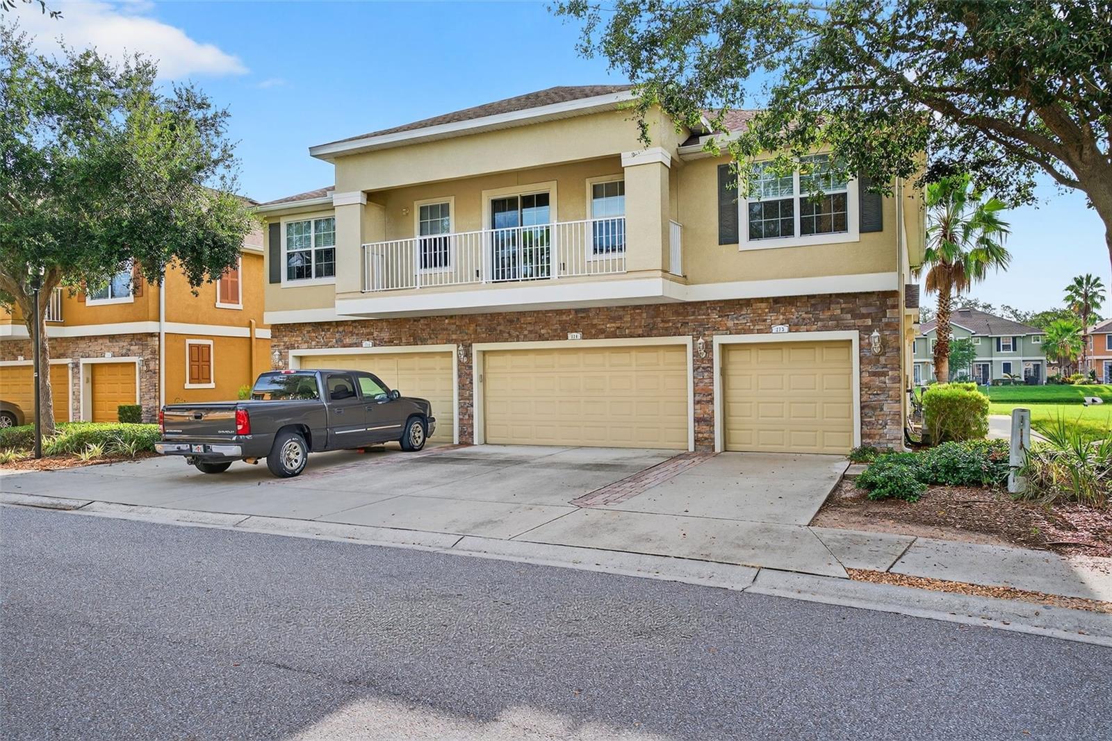 One or more photo(s) has been virtually staged. Welcome to maintenance-free living in the beautiful gated community of Schooner Cove! This stylish 2-bedroom, 2-bath townhome-style condo with a private 1-car garage offers thoughtful upgrades and a layout that lives large. Enjoy vaulted ceilings, smart fans, smart light switches, and a smart garage opener, along with an open-concept floorplan full of natural light.
The modern kitchen is a true showstopper with waterfall quartz countertops, a farmhouse sink, custom backsplash, stainless steel appliances, and a convenient built-in desk area. The refrigerator, washer, and dryer are all new from 2023. You'll love the luxury vinyl plank flooring — waterproof, pet-friendly, and installed over shock-absorbing padding that makes it soft underfoot.
The spacious living and dining area flows right onto a large private balcony overlooking the community’s green spaces — perfect for morning coffee or winding down in the evening.
The primary suite features a walk-in closet, double vanity, garden tub/shower, and a private water closet. The second bedroom is ideal as a guest room or home office, with a full bath nearby. Additional highlights include a separate laundry room (washer/dryer included), a 2020 HVAC system (16 SEER with UV bulbs), smart Ecobee thermostat, owned water softener, and a whole-home water filtration system.
Garage extras include retractable overhead storage and 2 mounted bike racks. HOA fees include roof maintenance and access to top-tier amenities such as a heated resort-style pool, spa, clubhouse, fitness center, and gated entrance.
Located in Flood Zone X (no required flood insurance) and just minutes from MacDill AFB, the Selmon Expressway, Westshore Marina District, Downtown Tampa, and St. Pete. You’ll love the pet-friendly green spaces and the welcoming, active community vibe. Come see why this one stands out from the rest!