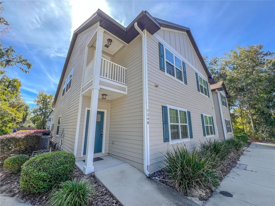 Welcome home to this charming 2-bedroom, 2-bathroom townhome in the desirable Blues Creek community. This spacious residence offers an inviting open-concept living area with vaulted ceilings and abundant natural light, creating a bright and airy atmosphere. The modern kitchen features granite countertops, stainless steel appliances, and ample cabinet space, making it perfect for everyday living and entertaining. The primary suite includes a large walk-in closet and a beautifully tiled ensuite bath with a soaking tub, while the second bedroom and full bath provide excellent flexibility for guests or a home office. Enjoy relaxing on your private covered patio or balcony, surrounded by lush landscaping in a peaceful neighborhood setting. Conveniently located near shopping, dining, and UF, this home blends comfort, style, and convenience—ready for its next residents! Grad students welcome. 2 pets welcome.