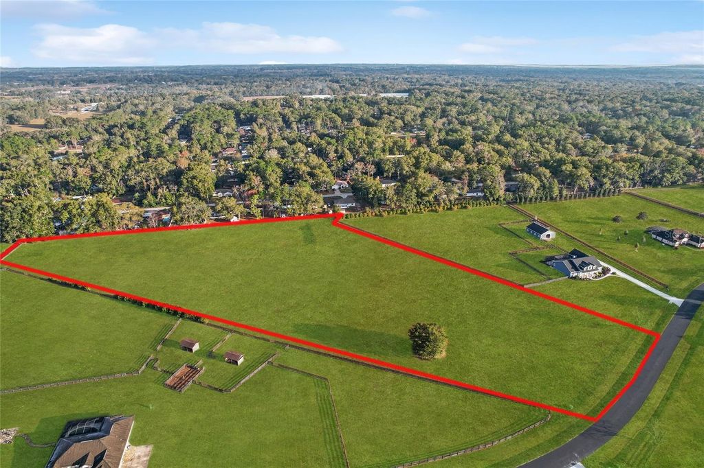 Photo of NW 54th Loop, Ocala, FL 34482 (MLS # OM720039)