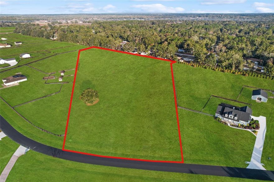**8.28 Acres in Hunterdon Hamlet – Equestrian Paradise in Ocala’s NW Horse Country**
Discover the perfect canvas to build your dream home on this remarkable 8.28-acre lot in the highly sought after, Hunterdon Hamlet community. Tailor-made for equestrian enthusiasts, this sprawling property offers access to an array of amenities that celebrate the equestrian lifestyle. Hunterdon Hamlet boasts bridle trails, 14 acres of lush pastureland, riding areas, and an impressive community 10-stall block barn—all designed to enhance your love of horses and the outdoors.

Nestled in the heart of Ocala’s world-renowned NW horse country, this parcel is just 4 miles from the World Equestrian Center (WEC), a global hub for all things equestrian, and conveniently close to top-rated restaurants, charming shops, and essential services. Build your custom home surrounded by Ocala's natural beauty and join a welcoming, vibrant community that celebrates its status as the 'Horse Capital of the World.' 
Whether you’re an avid rider or simply looking to immerse yourself in the tranquility of equestrian living, this property delivers the ideal mix of luxury and location. Make your dream a reality—this is more than land; it’s a lifestyle.