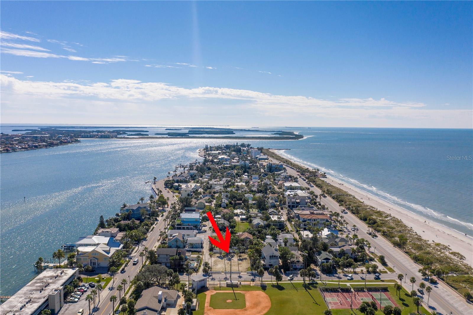 PASS A GRILLE DREAM HOME LOT 57. One of the most unique properties to come to market in Historic Pass a Grille Beach. 50 x 100 ft lot situated directly across from the Hurley Park provides plenty of green space and magnificent water views of the Gulf of Mexico and Pass a Grille Channel. Enjoy living across the narrow one way street from infamous Hurley Park boasting Tennis Courts, Pickle Ball, Basketball and the Historic Hurley Little League Field. Fabulous South of the Don Cesar location in the prestigious but never pretentious Historic Community hosts charming shops and fishing village style restaurants, the St. Petersburg Yacht Club-Beach Club, and more! Only steps to the white sandy Beach and anglers delight fishing along the Pass A Grille Boardwalk. Easy access off the Island to Downtown St. Petersburg to visit the trendy restaurants, award winning museums or to catch a Rays or Rowdies game. 30 Mins to Tampa Int'l Airport making Business or Casual travel a breeze!