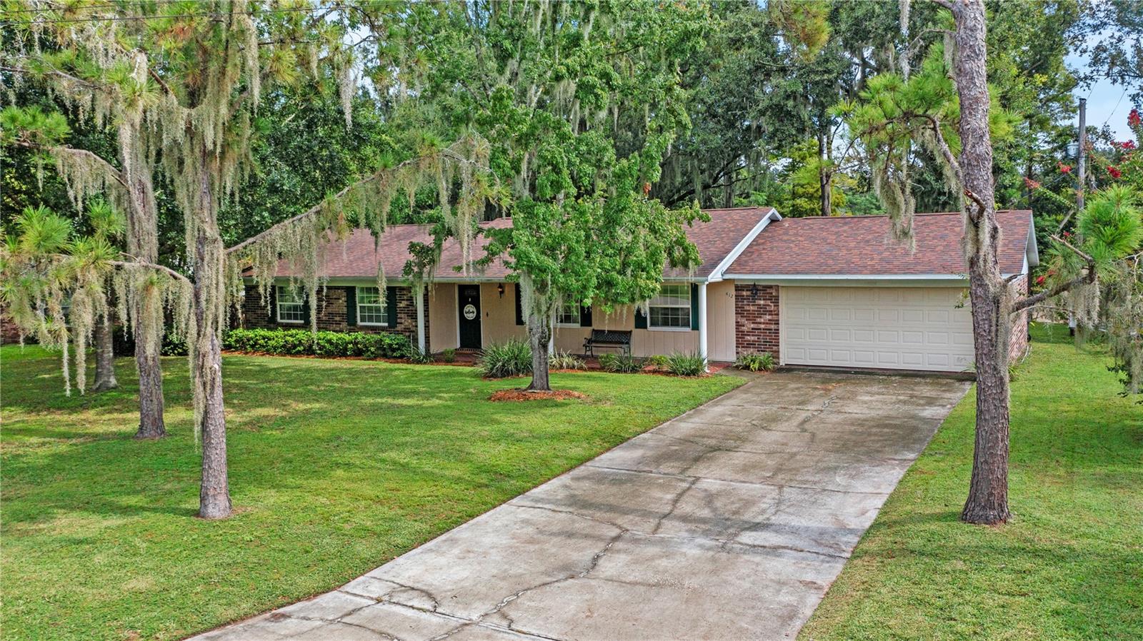 Welcome to 412 Lake Dr! This charming 3-bedroom, 2-bathroom ranch-style home with a brick façade and two-car garage is located in the heart of South Lakeland. Tucked away at the back of the community, the property offers privacy and beautiful pond views while sitting on a generously sized parcel.
Inside, you’ll find a formal living room and a well-appointed kitchen featuring granite countertops that open to the family room—perfect for both everyday living and entertaining. Each of the three bedrooms are spacious and filled with natural light, creating a warm and inviting atmosphere.
With a newer roof and updated windows, this home provides peace of mind and lasting value for its next owner. Don’t miss this opportunity to enjoy a private setting with all the conveniences of South Lakeland living!