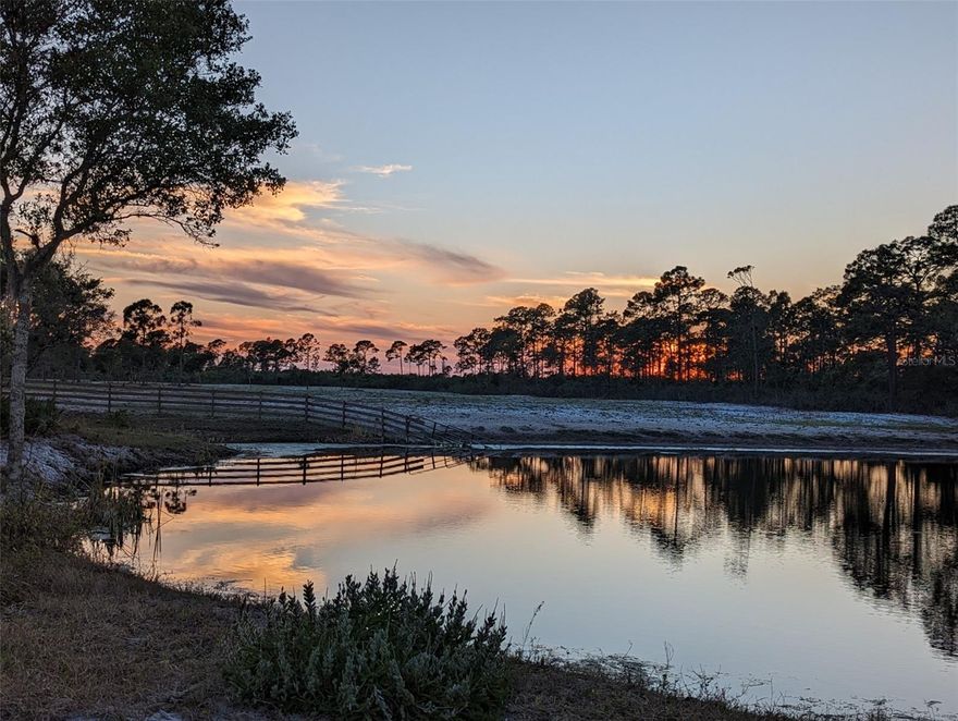 +/- 134 acres of native Florida cattle ranch surrounded by pristine natural wooded hunting land.   Motivated seller will entertain all offers and will consider owner financing with flexible terms.  This property consists of 22 parcels of A1, FR, & RC zoning), surrounded by hundreds of acres of vacant mitigation/conservation land (state/county owned and/or managed), accenting the natural beauty and teeming wildlife. Property has incredible potential and is currently being used as an active cattle ranch. All building and zoning code violations/fines/liens (identified during a foreclosure process) have been CORRECTED and REMOVED. These included building code violations from converting barns and storage buildings into active residential dwellings without required permits. Building 1 (previously an enclosed barn) was converted into a 3/2 single family dwelling, and Building 2 (previously a storage shed) was converted into a 1/1 tiny home. Property is currently under Agricultural Exemption for tax year 2025. Come see the pristine beauty and serenity of this majestic and unique property in East Central FL. Enjoy hunting, fishing from the stocked ponds, or watch rocket launches with family and friends from your private lakefront oasis. Opportunities are endless! Located in beautiful Oak Hill- near Mosquito Lagoon and Merritt Island Wildlife Refuge.  Two of the smaller parcels are currently under a Conservation Easement (+/- 5 acres) on the northwest and southwest boundaries of the property. This amazing property is minutes from the  Space Coast, less than an hour from Orlando, less than 30 minutes from Daytona Beach, and less than 30 minutes from Cape Canaveral. Buyer to verify all information. Owner/Seller is a licensed Florida Real Estate Broker.