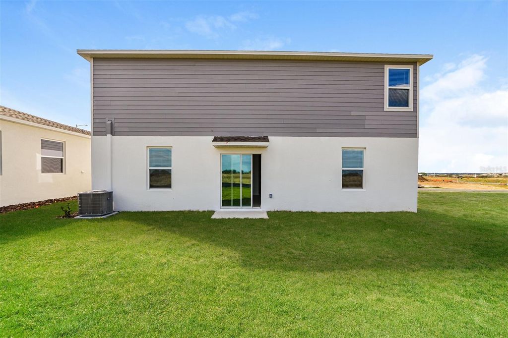 Photo of 3028 W Chicago Avenue, Haines City, FL 33844 (MLS # O6368644)