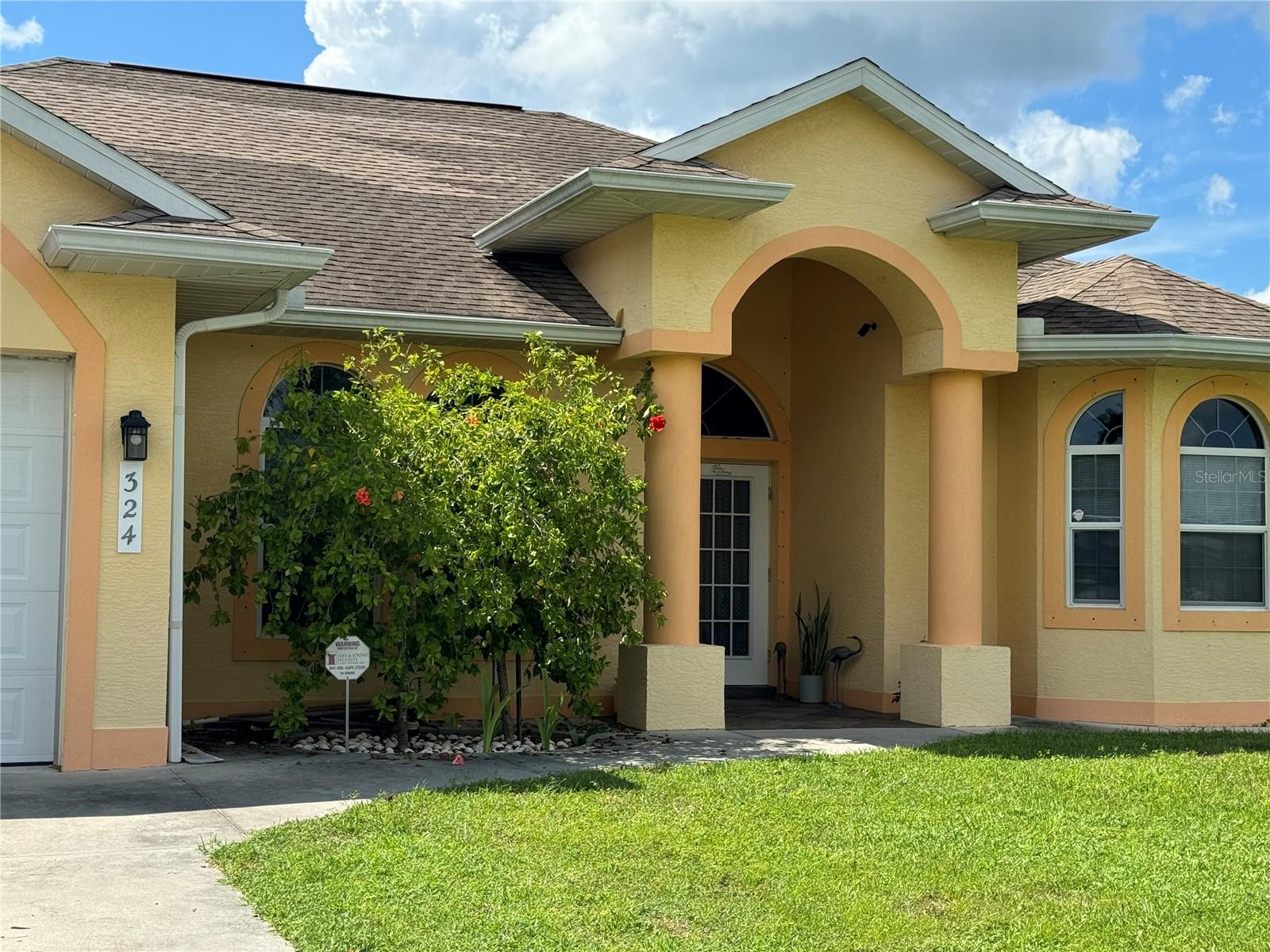 Nestled in the serene and growing North Port area in Florida, this no-flood zone, HOA-free property guarantees peace and freedom, making it an ideal haven for anyone seeking a balance between suburban tranquility and urban convenience. The home not only captures architectural beauty with its elegant columns, arches, and double coffered ceilings but also boasts a highly sought-after split bedroom floor plan, enhancing privacy and comfort. Each of the three bedrooms is thoughtfully placed, with the master suite enjoying its secluded space for added privacy.
Adding to the allure, the house features a modern kitchen complete with a central island, offering a perfect spot for meal preparations and casual dining, all laid over durable porcelain tiles that ensure longevity and ease of maintenance. The home encompasses three bathrooms, catering to the needs of families and guests alike.
Positioned on a spacious 75X100 lot, the property is well-equipped for storm safety, featuring patio accordion shutters. Its strategic location bridges the gap between the tranquility of suburban life and the conveniences of urban living. Additionally, this prime location is just a step away to Warm Mineral Springs, offering therapeutic and recreational benefits right at your doorstep. For shopping convenience, Costco is just a 5-minute drive away, ensuring that all essentials are easily accessible. Situated close to I-75 & Tamiami Trail, downtown Wellen Park, and Venice, residents have easy access to more shopping, dining, and healthcare facilities. The proximity to award-winning beaches and the Atlanta Braves' Spring Training facility further blends leisure and local pride seamlessly, offering residents an unbeatable combination of comfort and convenience.