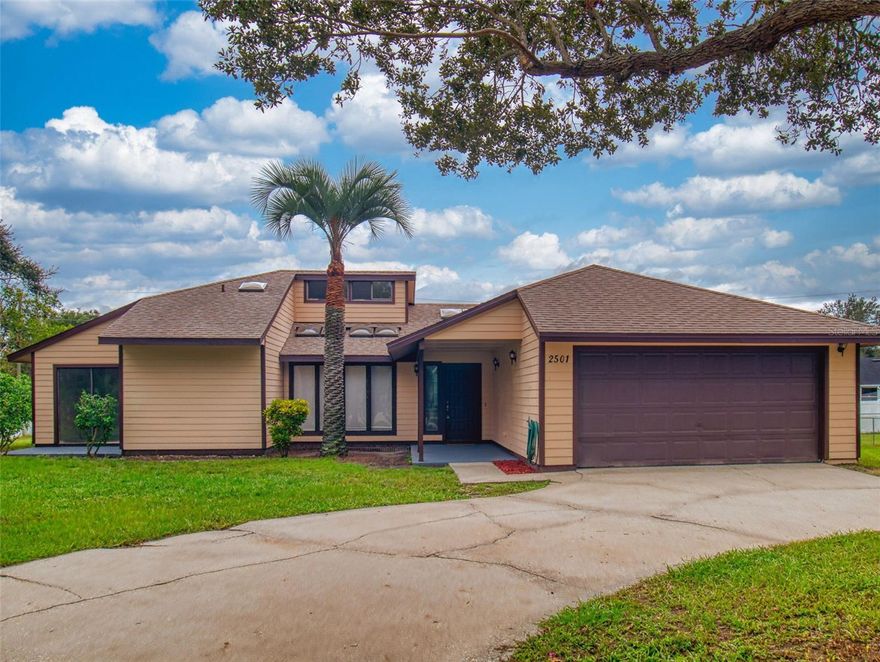 Beautifully Renovated 4-Bedroom Home on Nearly Half an Acre! This stunning 4-bedroom home, originally renovated in 2018 and just refreshed with new interior and exterior paint, sits on a nearly half-acre lot shaded by mature oak trees with a spacious back yard. With fantastic curb appeal, a welcoming covered front entry, and a long sweeping driveway leading to a 2-car garage, this property makes a lasting first impression. Inside, you’ll find ceramic tile flooring throughout, cathedral ceilings, skylights, and a cozy wood-burning fireplace. The large eat-in kitchen features soft close custom wood cabinetry, granite countertops, a generous island, and a convenient pass-through to the living and dining rooms. Both bathrooms have been remodeled with cabinets and granite countertops, and the oversized master suite boasts a huge walk-in closet and sliding glass doors that open to a private patio. Additional highlights include a wet bar, inside laundry, and thoughtful upgrades throughout. Major updates offer peace of mind: roof (2022), A/C & ductwork (2021), and septic system & water heater (2018). This move-in ready home offers space, style, and comfort—all at the right price. Don’t miss this rare find!