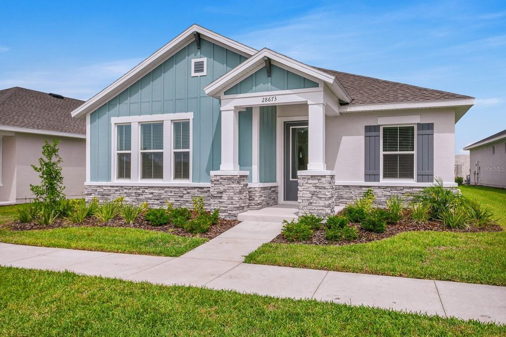 Photo of 28673 Hillcrest Valley, Wesley Chapel, FL 33543 (MLS # T3442446)