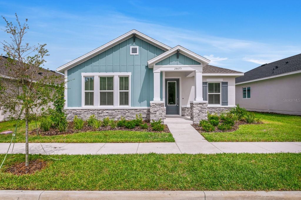 Photo of 28673 Hillcrest Valley, Wesley Chapel, FL 33543 (MLS # T3442446)