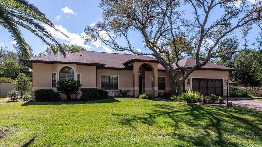 WELCOME HOME! This lovely and well taken care of home sits in the beautiful picturesque neighborhood of Majestic Oaks! This POOL home is a 3/2 in a cul-de-sac; It has grand high ceilings and plenty of space to grow or just spread out! This home has a NEW ROOF (2023), HEAT PUMP/HVAC (2023), and newer appliances! The space is great with a split floor plan, living room, family room, dining room, and eat-in kitchen. The kitchen features stainless steel appliances and beautiful cabinetry. The master bath is fantastic, forget those old garden tubs...this has a freestanding porcelain tub! Bedrooms are spacious and have great closets. The caged pool area is so inviting with plenty of space to entertain under the covered lanai! The pool is quite large with a spa overflowing into it! Beyond the pool is a fenced yard that has beautiful trees and landscaping. This home is just moments away from shopping, hotels, dining options, and hospitals.  You must come take a look! It's fantastic!