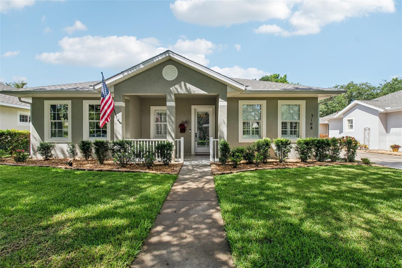 Prepare to be impressed by this truly delightful home, where no detail has been overlooked. Step inside and discover a dream kitchen, fully renovated in 2018 with warm all wood, soft-close cabinets, granite countertops with seating, tile backsplash and SS appliances. Throughout the home, you'll appreciate the beautiful tile flooring, replacing all carpet and vinyl for a fresh, cohesive look and NO carpet! Comfort is key with newer ceiling fans throughout and an updated AC unit (2020) paired with new blown-in insulation in the attic (2020) for optimal energy efficiency. Both bathrooms have been tastefully upgraded, including Corian sinks and vanity tops (2021), and the second bath boasts a new walk-in shower with modern fixtures (2021). The home also features new door hinges, handles, and knobs throughout! Beyond the interior, the upgrades continue! The lanai has been transformed (2022) into a four-season haven with new vinyl windows and Coolerae shades, making it a perfect spot to relax year-round. You'll also find a new roof and lanai panels (2022), new guttering (2022 & 2023), water heater (2021)and an epoxy garage floor (2018). Practical additions like a central vacuum system (2019), laundry room cabinets (2018), and pull-down attic stairs (2020) further enhance daily living. Even the garage offers comfort with two new ceiling fans (2019)! With so many significant updates, this home offers unparalleled peace of mind and comfort. Halifax Plantation is a vibrant and active community and a great place to call home! Don't miss the opportunity to own this exceptional Dunmore gem! *Bundled service pricing available for buyers. Connect with the listing agent for details*