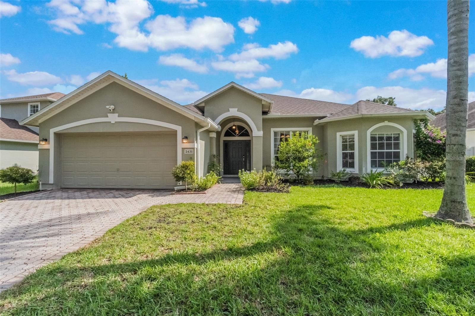 Welcome to this beautifully appointed home in the Brighton Lakes Community, where comfort meets convenience. This spacious residence offers three bedrooms, two baths with a thoughtfully designed layout and multiple living areas, perfect for both entertaining and everyday living. The kitchen features stainless steel appliances, ample cabinetry and a breakfast nook that opens to a bright family room. This home includes a generous primary suite with two walk-in closets and private en-suite bath with oversized soaking tub. Split bedroom design provides plenty of space for relaxation and privacy. High Ceilings and large windows create an airy, inviting atmosphere throughout. Step outside to enjoy the oversized screen enclosed patio overlooking the conservation view backyard, ideal for morning coffee or evening gatherings. This property also includes a two-car garage with ample parking and storage and upgrades galore. Brighton Lakes offers community pool, clubhouse, playgrounds, fitness center and just minutes from shopping and dining. Book your private viewing today!