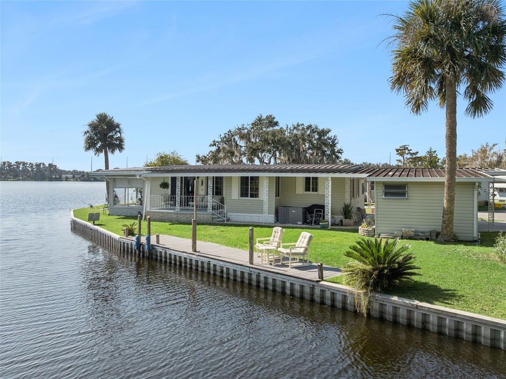 Photo of 120 Breezy Point, Eustis, FL 32726 (MLS # O6363157)