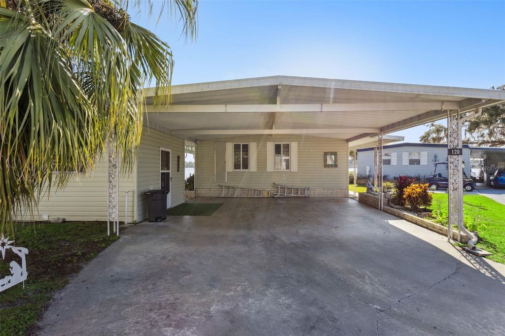 Photo of 120 Breezy Point, Eustis, FL 32726 (MLS # O6363157)