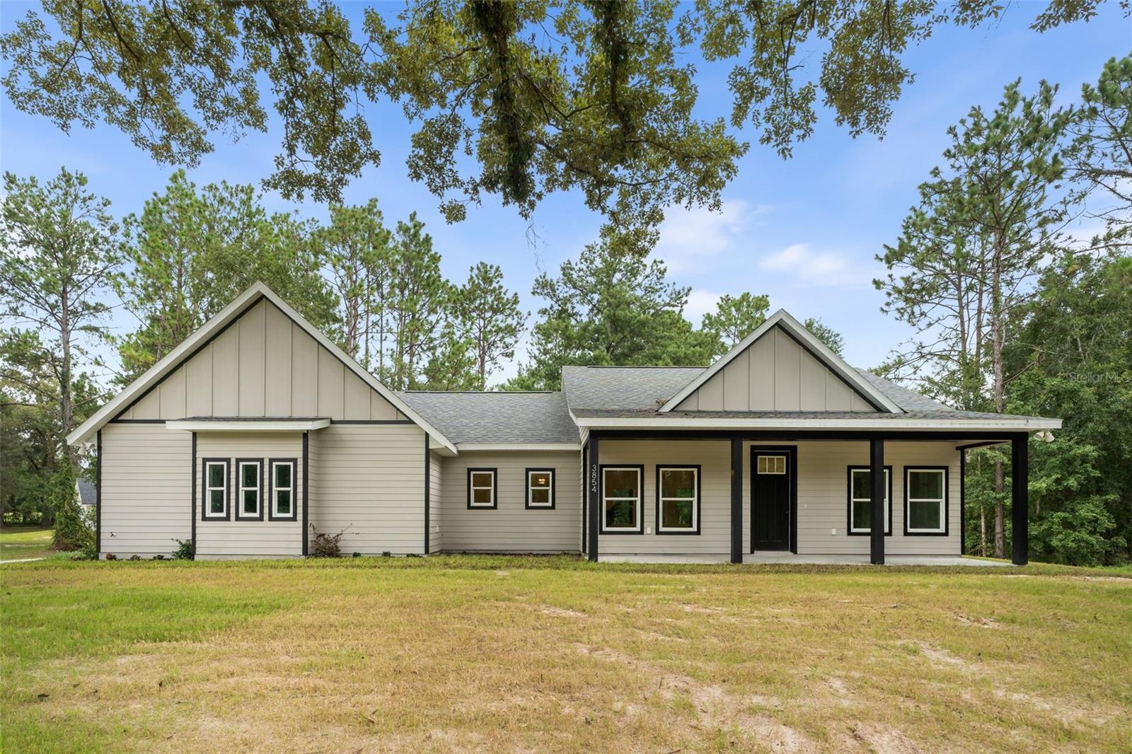 Step into The Cypress, a stunning farmhouse-style home offering 1,845 sq ft of thoughtfully designed living space with 3 bedrooms and 2 bathrooms. From the welcoming covered front porch, you’ll enter an open floor plan that flows from the great room to the dining area and a gorgeous kitchen featuring a large island, double sink, stainless steel appliances (microwave, refrigerator, oven/range, garbage disposal), ceramic tile backsplash, and a butler’s pantry with its own sink, counter and ice machine! The laundry room and mud room are ideally placed near the 2-car garage and the private primary suite, which offers a spa-like bath with dual sinks, soaking tub, separate shower, water closet, and walk-in closet. Two additional bedrooms share a spacious hall bath, while the covered rear porch is perfect for outdoor living. This home comes loaded with upgrades including COREtec® waterproof engineered wood flooring, designer exterior and two-panel interior doors with matte black hardware, Anderson windows, Hardie siding on all sides, Delta plumbing fixtures and valves, ceiling-height ceramic tile shower, designer mirrors and vanity lights, ceiling fans in each room, custom window and door casing, soft-close cabinetry with designer pulls, quartz countertops, and Owens Corning Oakridge laminated architectural shingles. The Smart Home Technology Package provides a central control hub with voice/touch operation, video doorbell with two-way audio and live view, interior doorbell indicator, smart entry lock with biometric/keypad access, programmable Wi-Fi thermostat, and whole-home Wi-Fi mesh system with up to three extenders. With its perfect blend of farmhouse charm, luxury finishes, and modern technology, this home is a must-see—schedule your showing today!