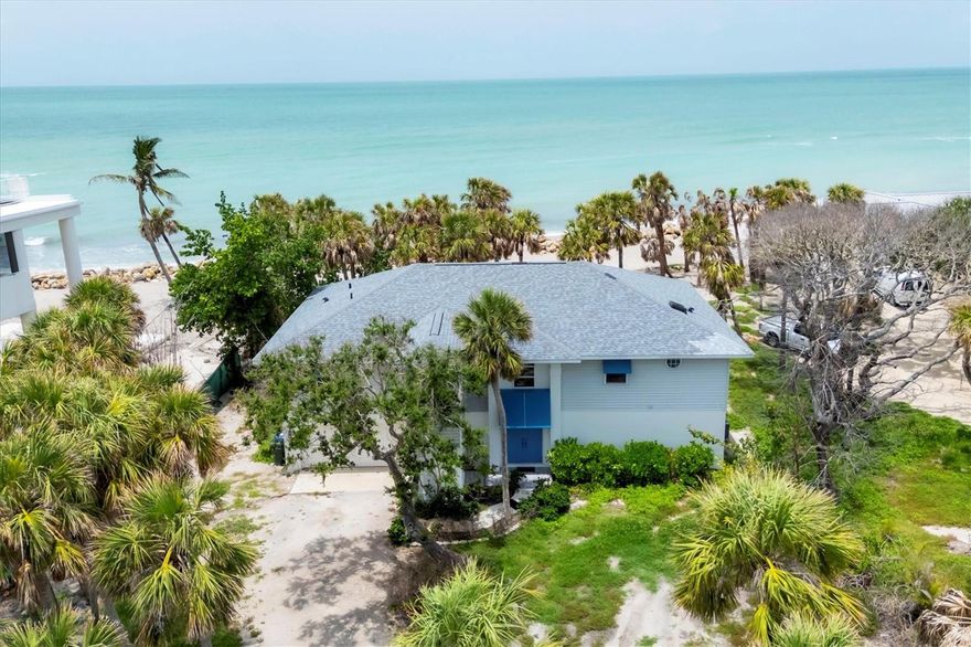BEST priced Gulf front home!  Welcome to your private beachfront escape on the quiet and unspoiled shores of Manasota Key. Tucked away on a lushly landscaped 0.64-acre lot with about 103 feet of direct Gulf frontage, this serene retreat offers relaxed, Old Florida charm. Step inside this mostly furnished coastal home and soak in sweeping views of the Gulf of Mexico—from nearly every room. Whether you're looking for a peaceful getaway or a full-time seaside sanctuary, this home blends comfort, style, and an unbeatable location right on the water. Notable highlights and recent upgrades include a private elevator for added convenience and luxury, some impact-resistant sliding glass doors & an impact-resistant garage door for enhanced safety, a newly installed riprap shoreline (2022) providing durable coastal protection, and a brand-new roof (2021) for peace of mind. With three bedrooms and two baths, the open layout feels airy and welcoming. You'll find plenty of storage with generous hallway closets, while the primary suite offers a true sense of retreat—with hardwood floors, two walk-in closets, impact-resistant sliders, and a spa-like bath featuring a soaking tub, walk-in shower, and dual vanities. Upstairs, the living and dining areas offer hardwood floors and panoramic Gulf views. Step out onto your screened lanai to enjoy ocean breezes and front-row seats to spectacular sunsets. Downstairs, there's a two-car garage, impact sliders, and a large open space—ideal for storage or finishing to suit your needs. Outside, tropical landscaping frames your private path to the beach. There’s even an outdoor shower and a sun deck off the lanai—perfect for laid-back afternoons after a swim in the Gulf. If you’ve been dreaming of quiet walks on the beach, gentle sea breezes, and the kind of coastal lifestyle that feels worlds away—this is your chance to customize & personalize this slice of paradise to make it your own. Discover the serenity, beauty, and timeless appeal of Manasota Key.