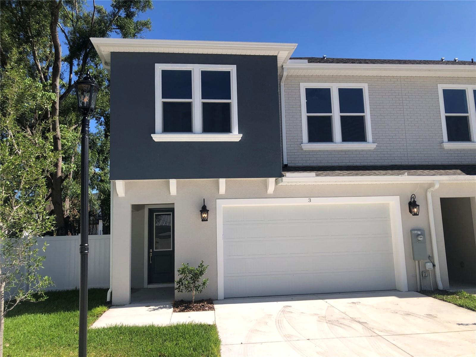 This 2 year old Luxury townhome is available for rent. OVER $50K worth of UPGRADES INCLUDED. 2867 sq ft townhome that feels like a spacious single family home. This open wide spacious floor plan with 4 bedrooms (split plan) features open dining/living/kitchen concept, tray ceilings, crown molding, luxury distressed engineered oak hardwood floors, porcelain large tile, upgraded new carpet, modern ceiling fans, upgraded plumbing & electrical fixtures, TV outlets and cable connections in all bedrooms, high ceilings and 8 ft high doors. Kitchen upgrades include gas cooktop, wall oven microwave combo, under cabinet lighting, quartz countertops, kitchen island with eat in kitchen space, wine rack with wine fridge and walk in pantry. Spacious master bedroom includes walk- in closet, tray ceiling, master bath with dual sinks. walk in shower and free standing tub. Second bedroom has its own bathroom. Upstairs den/loft area is a bonus for entertaining. Large size laundry room includes a utility sink and gas stub for clothes dryer. Plenty of storage room in this must-see home that has its own fenced in side yard. Located in Plant High School district. This townhome is conveniently located near shopping malls, fine dining, sport venues, entertainment, MacDill AF base, airports and more. Growing neighborhood with lots of new construction.