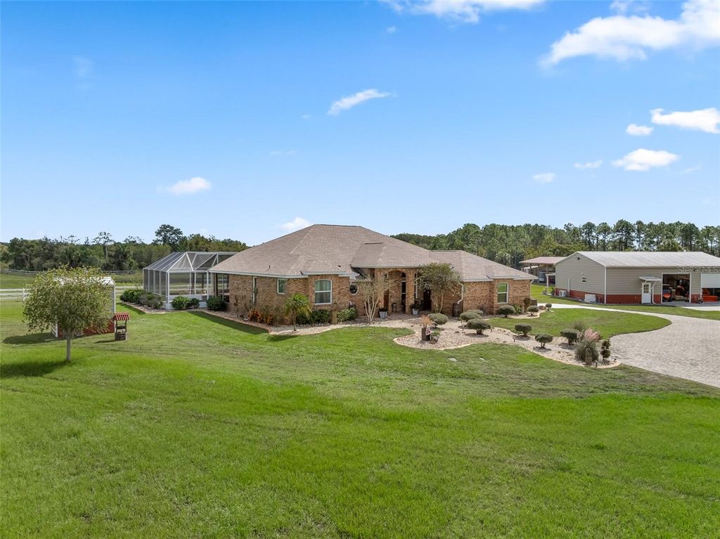 Photo of 620 Willow Pond Lane, Osteen, FL 32764 (MLS # O6356800)