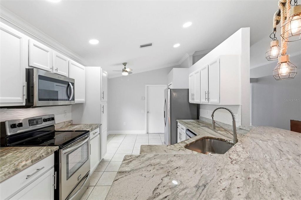 Photo of 5419 Seattle Slew Drive, Wesley Chapel, FL 33544 (MLS # TB8496038)