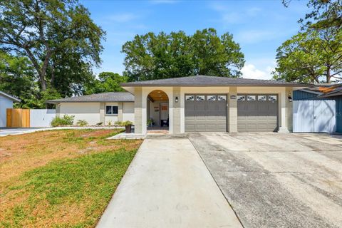 Photo of 8331 W Pocahontas Avenue, Tampa, FL 33615 (MLS # TB8502727)