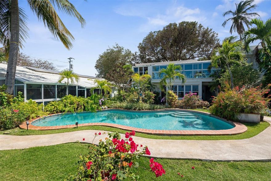 This spectacular ocean front property located at the end of a private, gated block is a gem among gems with nearly 1/4 acres of land and 140+ feet on the water.  5400+ square feet of construction in an undeniably perfect layout to maximize views and openness, this property currently operates with some rental units and a main residence that can easily continue to generate income or be remodeled into one of San Juan's most spectacular waterfront homes.  This is one of less than 20 beachfront lots of its kind anywhere in the metro area, and they're never for sale.  One of a kind, strategically located for maximum privacy and convenience, this is the compound with ocean views from everywhere you've been dreaming of.  Call today for a private tour!