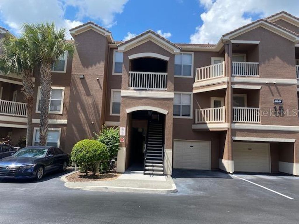 Photo of 8849 Villa View Circle #203, Orlando, FL 32821 (MLS # O6371230)
