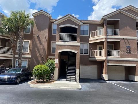 Photo of 8849 Villa View Circle #203, Orlando, FL 32821 (MLS # O6371230)