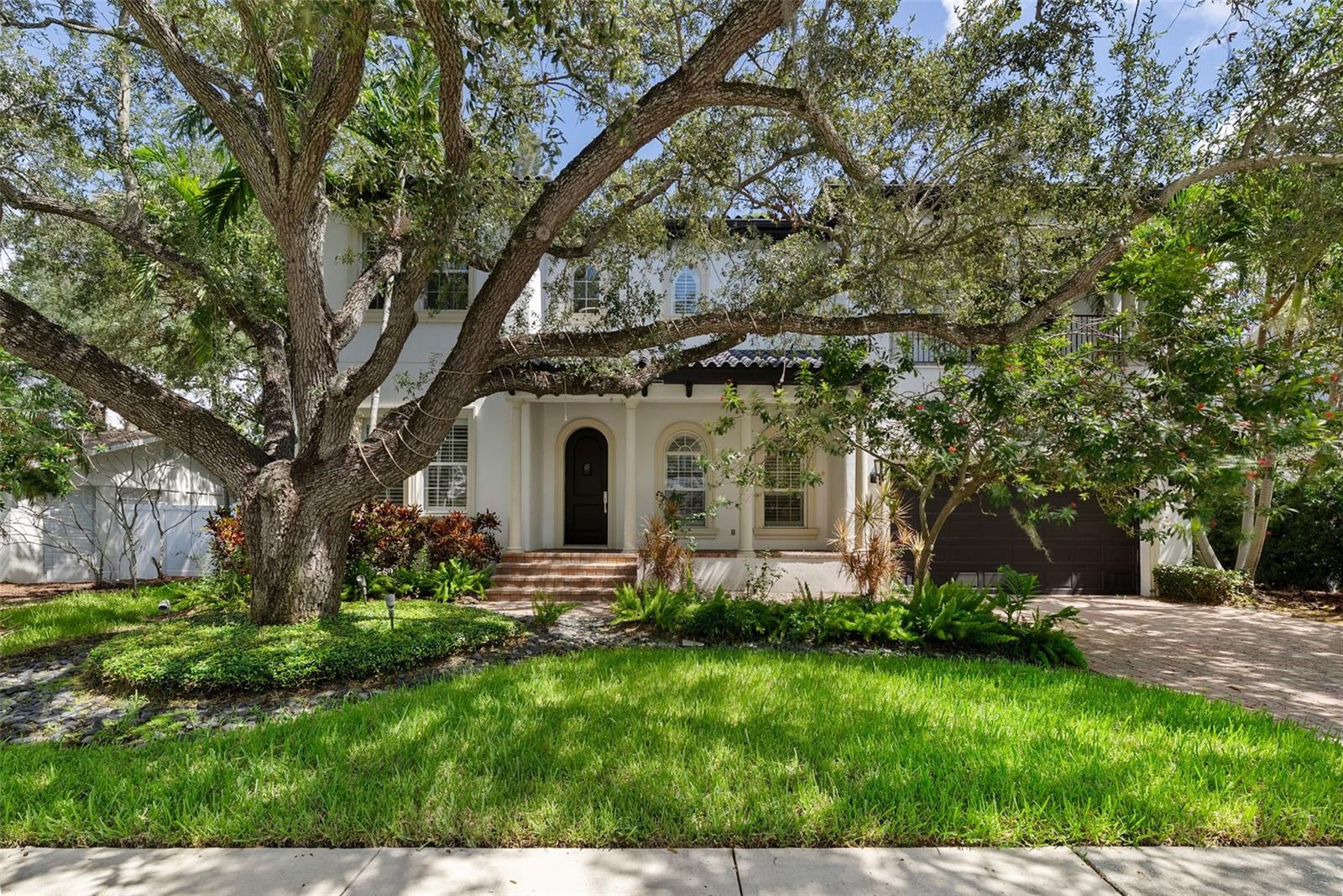 Exceptional opportunity in South Tampa’s premier school district—Mabry, Coleman, and Plant! This beautifully crafted
custom home blends timeless elegance with modern luxury, featuring rare elevated ALL-BLOCK construction at 11.6
feet—comparable to today’s finest new builds. Meticulously updated, it boasts an open, light-filled layout with soaring
10-foot ceilings on both levels and rooms far larger than typical South Tampa homes. Brand-new flooring and fresh
paint create a crisp, contemporary feel. The gourmet kitchen offers top-tier appliances—JennAir refrigerator, Miele
dishwasher, Thermador gas range—and generous workspace. A first-floor guest suite includes a private bath. Upstairs,
three bedrooms have en-suite baths, plus a versatile fourth room. The expansive primary suite is a true retreat. Extras
include plantation shutters, dual HVAC (one new 2020), new tankless water heater (2023), Samsung washer/dryer,
saltwater pool, oversized backyard, and two-car garage with dual EV outlets. Minutes to Bayshore, Hyde Park, Water
Street, shopping, dining, and beaches.