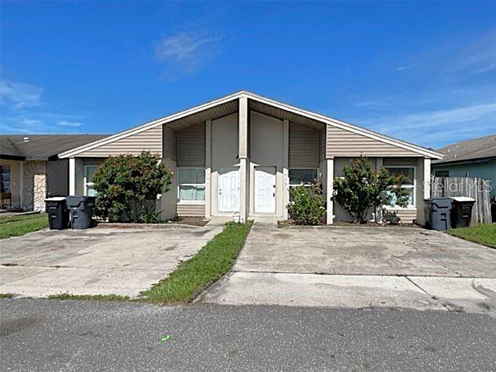 One or more photo(s) has been virtually staged. Check out this 2 bedroom 2 bath 1/2 duplex. This home has been freshly painted in the inside. Tile floors (no carpeting), formal dining room. Inside utility room. Spacious bedrooms with new tile floors. ceiling fans in all the bedrooms and living room, 2 car parking in driveway. Lawn care is included.