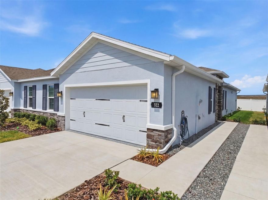 Welcome to 322 Voltaire Dr.! TRUELY A MUST SEE AND PERFECT OPPORTUNITY! THIS NEWER (2026) BEAUTIFUL MOVE IN READY HOME, 3BR, 2 FULL BATHS, AND 2 STALL GARAGE AWAIT YOU. The kitchen features white custom cabinets, granite counter tops, and stainless-steel appliances, and a large pantry. The kitchen adjoins the family room which is ideal for comfort and easy living space. The primary master suite offers ample space including a large walk-in closet. The primary bath has double sinks and a shower with a built-in seat. Both baths have quartz counter tops. Sliding doors lead to the newly screened in Lanai in the rear of the home. Low maintenance villa with a low HOA & NO CDD. Two private pickle ball courts and direct access to the Suncoast rail. Hurry and schedule your showing today.