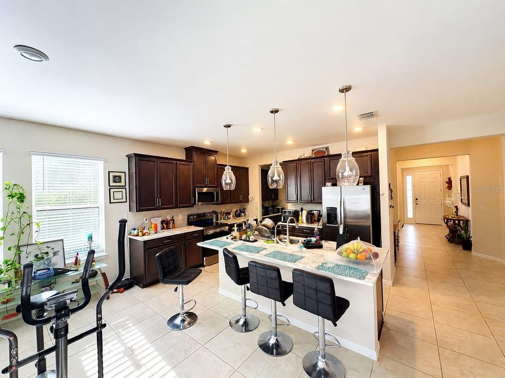 Photo of 1710 Goblet Cove St, St, Kissimmee, FL 34746 (MLS # O6406188)
