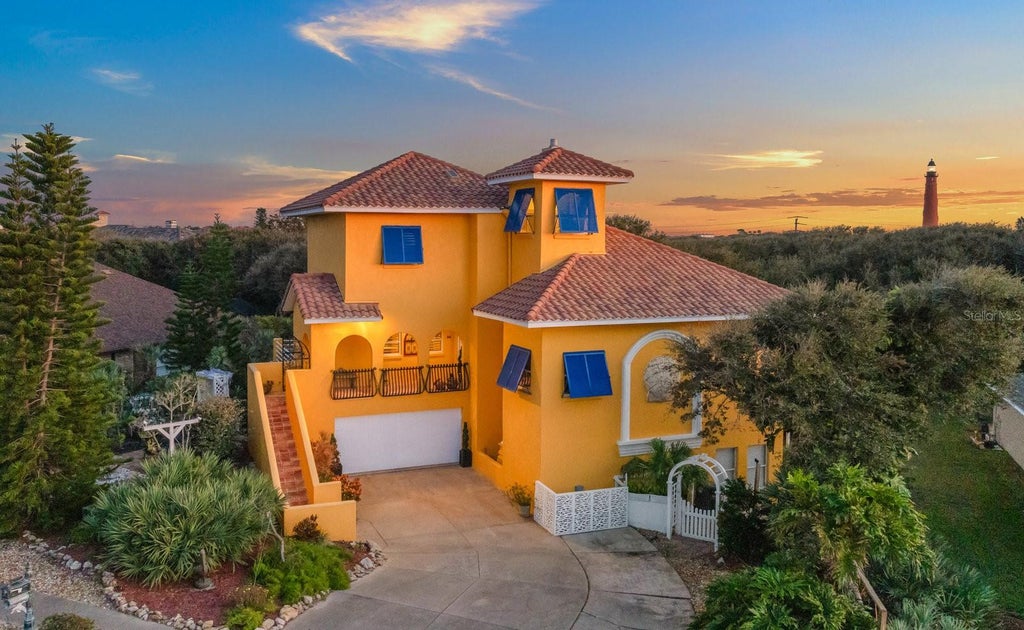 Photo of 55 Inlet Point Boulevard, Ponce Inlet, FL 32127 (MLS # V4950668)