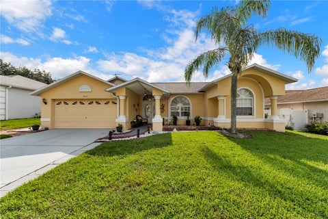 Photo of 1622 Crazy Horse Dr, Lutz, FL 33548 (MLS # TB8534292)