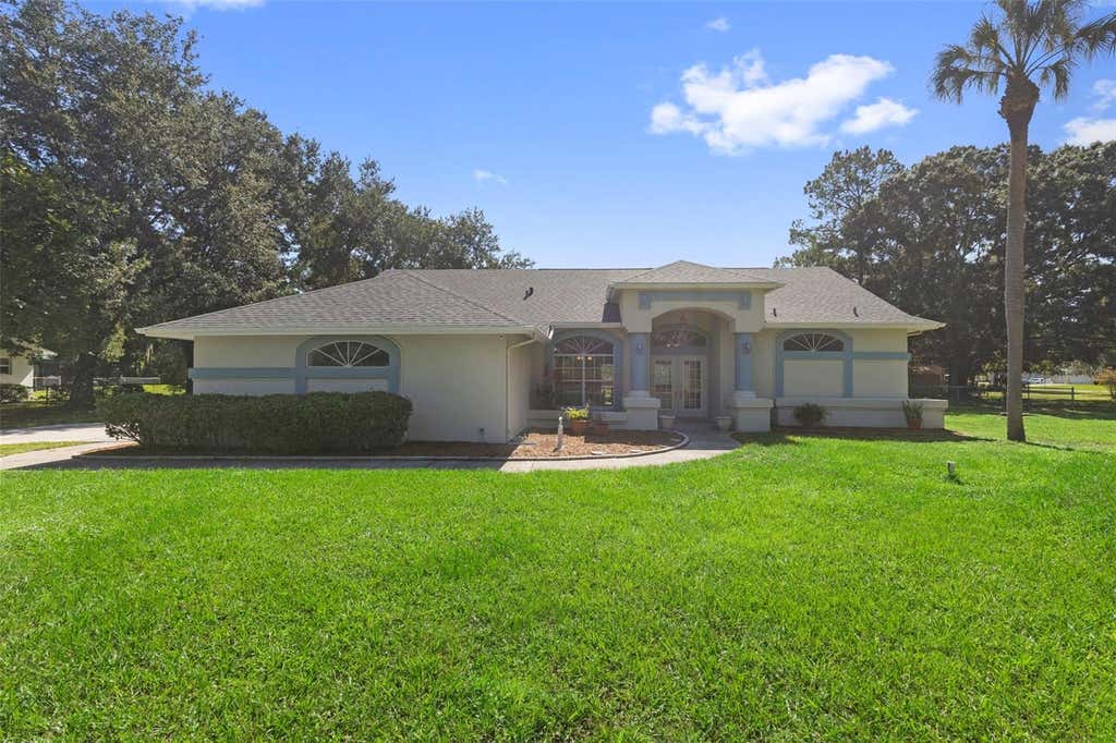 Photo of 17269 Raintree Road, Lutz, FL 33558 (MLS # TB8538046)