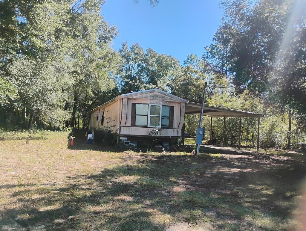 Photo of 4551 SW 194th Avenue, Dunnellon, FL 34432 (MLS # OM713100)