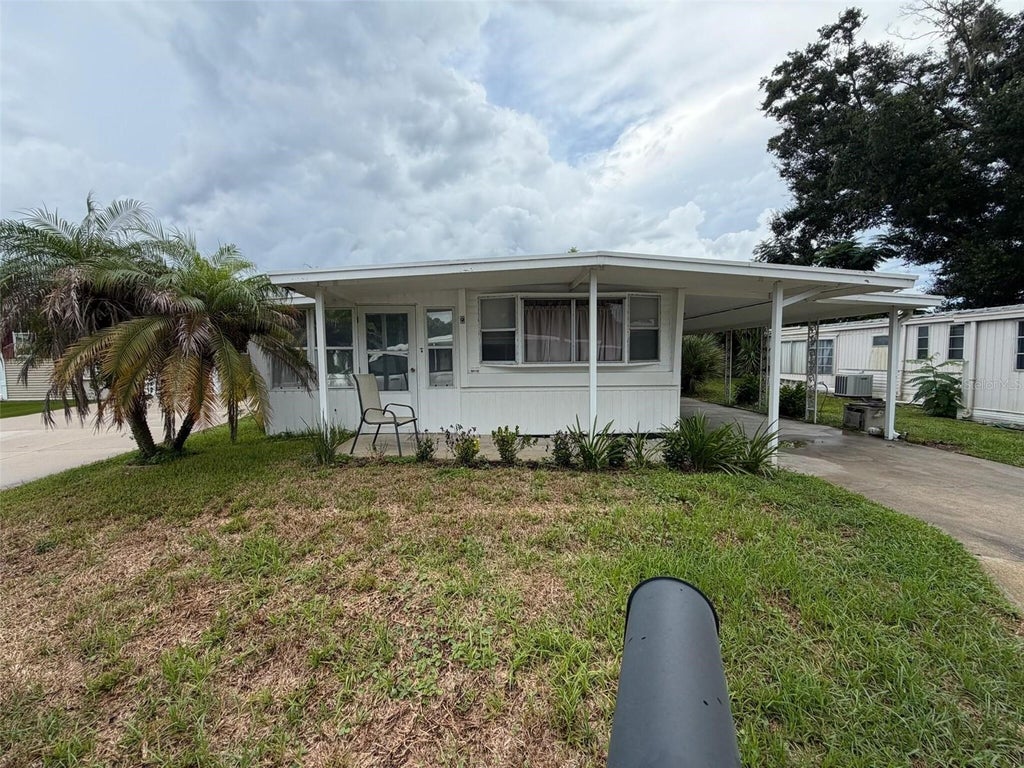 Photo of 112 Holiday Lane, Auburndale, FL 33823 (MLS # O6440504)
