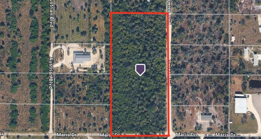 Photo of 29120 Maris Drive, Punta Gorda, FL 33982 (MLS # A4703948)