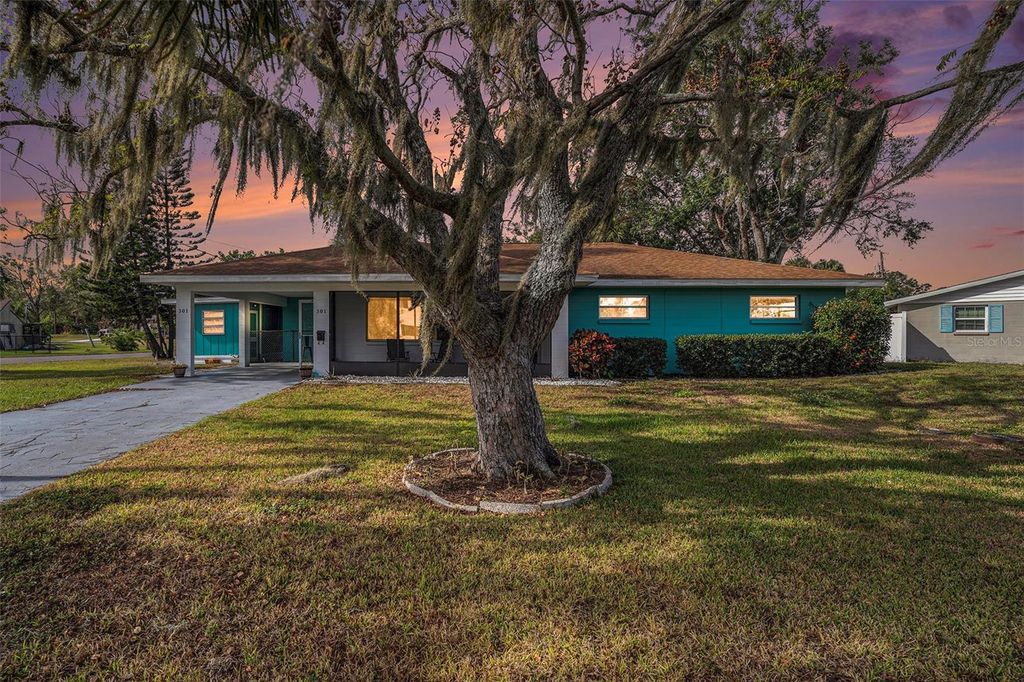 Photo of 301 Carlyle Boulevard, Ruskin, FL 33570 (MLS # TB8455199)