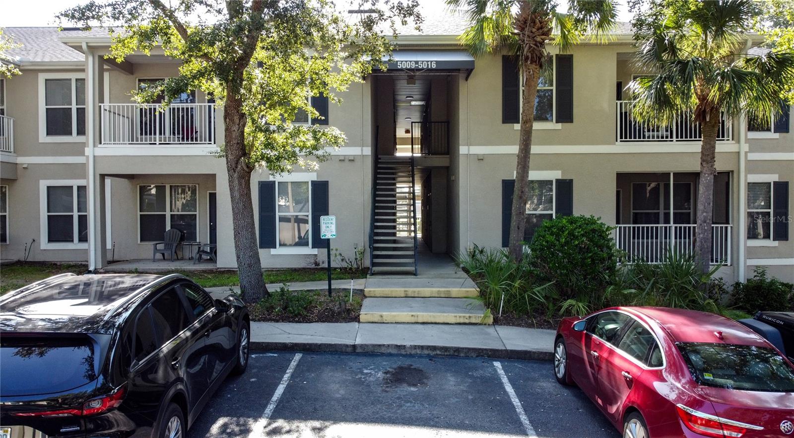 GROUND FLOOR CONDO IN GATED COMMUNITY! Welcome to this stylish 2 bed/2 bath ground floor corner unit in the award-winning, gated community of Southern Dunes Golf & Country Club and is being sold FULLY FURNISHED & TURN-KEY ready! Pride of ownership is evident with FRESH INTERIOR PAINT, Smartly Decorated dining FEATURE WALL, Painted cabinetry with updated hardware and NEW lighting throughout. Located just steps away from the community pool, fitness center and clubhouse, the home offers the desirable features of an open floor concept, neutral color scheme and UPDATED luxury vinyl flooring. The delightful kitchen has plenty of cabinetry, a breakfast bar that makes a great space for casual eating and entertaining and a dedicated dining area to host friends and family. The primary bedroom is oversized and offers a walk-in closet, separate linen closet and en-suite bathroom. The second bedroom is of comfortable size, has a large walk-in closet and is conveniently located next to the second full bathroom. For added convenience there is an indoor laundry room and additional storage/linen closets to accommodate multiple storage needs. Step onto your private porch with plenty of room for seating and partial views of Lake Joe, making it a perfect area for year-round enjoyment. This lovely residence is situated in the highly acclaimed championship Southern Dunes Golf Course and Country Club community offering 24 hr. security, tennis courts, community pools, fitness center, clubhouse, updated driving range and more. It is a short drive to Orlando or Tampa attractions, airports, shopping, Legoland and to either the Gulf or Atlantic beaches. This property is currently being used as a SHORT-TERM RENTAL and is managed by a premier property management company in the area providing consistent and profitable bookings. Whether you make this your primary residence, vacation home or long or short-term rental don’t miss out on this home’s full potential. Let someone else do the work and enjoy maintenance free living! Pack your bags and SCHEDULE your showing TODAY!