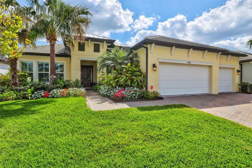 Nestled in the sought-after Oasis community within Wellen Park, this stunning executive home effortlessly combines elegance, luxury, and tranquility. As you approach 19832 Bridgetown Loop, the home's striking curb appeal immediately catches the eye, with a paver driveway and lead walk framed by lush tropical landscaping.
Upon entering, the expansive great room greets you with soaring ceilings, oversized tile flooring, custom window treatments, and elegant baseboards and crown molding add the perfect finishing touches. Both the living room and dining room feature tray ceilings and large sliding glass doors open to an exceptional outdoor living space. The custom 37’x15’ saltwater pool and spa is large and luxurious, boasting three waterfalls, a sun shelf, two seating ledges, LED lighting, and an oversized spa with cascading aqua spouts. The covered lanai with outdoor kitchen prep and the full-length pool cage, all adorned with travertine stone pavers, offers ample space for relaxation.
The gourmet kitchen, thoughtfully expanded by the current owners, is every chef's dream. Featuring high-end GE Profile appliances, including an induction cooktop, convection oven, convection microwave, and a quiet 45db dishwasher, the kitchen is designed to impress. A spacious LG French door refrigerator complements the extensive upgrades, which include expanded cabinetry with wine cooler, quartz countertops, custom lighting, pull-out shelves, a large corner pantry, and a beautiful new backsplash making it perfect for both everyday meals and entertaining guests.
Every corner of this home showcases thoughtful custom details. The three private bedrooms offer a resort-like experience with elegant chandeliers, plush carpeting, and custom window treatments. The owner's suite is a true retreat, featuring a tray ceiling, dual walk-in closets with California Closet systems, and a spa-like bath with a frameless glass walk-in shower, dual vanities with pull-out shelves, new quartz countertops, and a linen closet. Two guest bedrooms each feature adjacent bathrooms, and the current owners thoughtfully added a door to one bedroom providing a convenient connection to the pool bath, creating an available en-suite for guests.
This home offers a private den with engineered hardwood floors, French doors, a tray ceiling, and six windows that flood this space with natural light. An additional task room with custom built-ins can serve as a home office, homework station, craft room, or even a pet area. The laundry room is nicely upgraded with cabinets, a sink, and a washer and dryer surround. The spacious 3-car garage with epoxy floors and built-in shelving provides ample space for vehicles and storage. Rest easy knowing this home is equipped with impact glass windows and doors and sits above the high-risk floodplain.
Oasis is an intimate, established community in the heart of Wellen Park, an active and thriving area. The neighborhood features 136 luxurious homes with wider lots and tile roofs, with exceptional amenities including a community pool, clubhouse, pickleball court, and private gated access to Blue Heron Park, offering two miles of walking trails and two dog parks. Located just minutes from Downtown Wellen Park, the Atlanta Braves Spring Training stadium, and a wide range of dining and shopping options, this location provides the perfect balance of convenience and luxury.
Take a closer look at 19832 Bridgetown Loop – your personal “Oasis” in Wellen Park awaits!