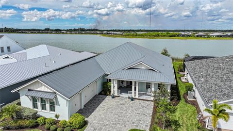 Photo of 42239 Lake Timber Drive, Punta Gorda, FL 33982 (MLS # C7506031)