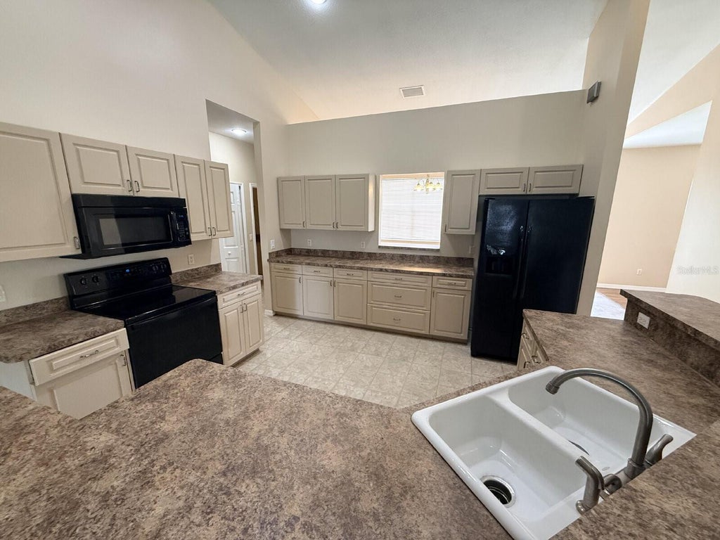 Photo of 359 Skyland Lane, Port Charlotte, FL 33953 (MLS # A4708461)