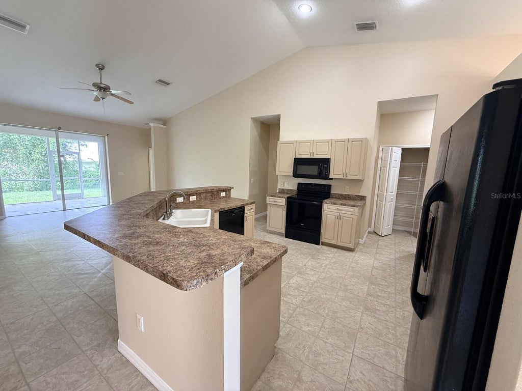 Photo of 359 Skyland Lane, Port Charlotte, FL 33953 (MLS # A4708461)