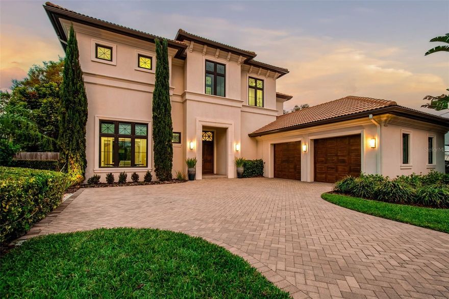 A rare opportunity to own a custom-designed 2017 Marc Rutenburg all-block home that redefines luxury, wellness, and design. Featuring 3 bedrooms, 2.5 baths, and 3,610 sqft of interior living space—plus nearly 1,000 sqft of seamless indoor-outdoor living—this residence lives larger than its size suggests, offering sophistication, comfort, and thoughtful design throughout. Step into the dramatic two-story foyer with 12-foot ceilings upstairs and down, and stunning floor-to-ceiling windows overlooking your private resort-style oasis. The open-concept layout is ideal for entertaining with a chef’s kitchen showcasing Sub-Zero and Wolf appliances, Taj Mahal quartzite countertops, custom cabinetry, an oversized island with bar seating, and a wet bar with dual wine refrigerators holding up to 292 bottles. Frameless sliders open to your outdoor retreat—a private haven featuring a bright blue pool with fire bowls, waterfall feature, outdoor kitchen with built-in grill, turf lawn, travertine pavers, and motorized mosquito screens for year-round enjoyment. For those who value health and wellness, enjoy a dedicated sauna and cold plunge for post-workout recovery and relaxation. Upstairs, the primary suite offers dual walk-in closets and a spa-inspired marble bath with dual vanities, freestanding tub, and oversized glass shower with multiple shower heads. The secondary bedrooms share an expansive bath, while the first-floor den with adjoining office can easily convert to a fourth bedroom or guest suite. Additional
upgrades include a brand-new water heater, a new A/C wall unit in the garage creating a fully climate-controlled home gym, motorized drapes, hurricane-rated windows and doors, and an extra-wide garage with ample storage. Perfectly positioned within close proximity to local restaurants, top-rated schools, tennis courts, and a nearby park, this home offers both convenience and lifestyle. Located just minutes from Hyde Park Village, International Plaza, Tampa International Airport, and major highways, it delivers the best of South Tampa living. Furniture optional for purchase. Nothing like it on the market—this home seamlessly blends wellness, design, and resort-style living unlike any new construction nearby. **Schedule your private showing today.