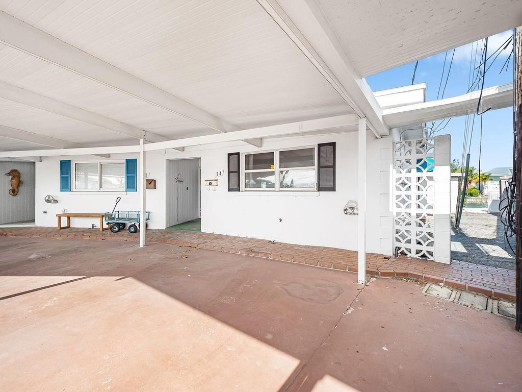 Photo of 34 Seaside Court, Holmes Beach, FL 34217 (MLS # A4675697)