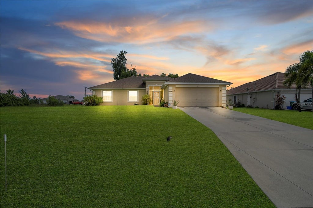 Photo of 1211 NW 27th Pl, Cape Coral, FL 33993 (MLS # TB8557698)