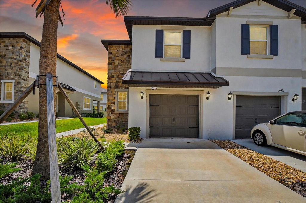 Photo of 10317 Trumpet Honeysuckle Way, San Antonio, FL 33576 (MLS # TB8470114)