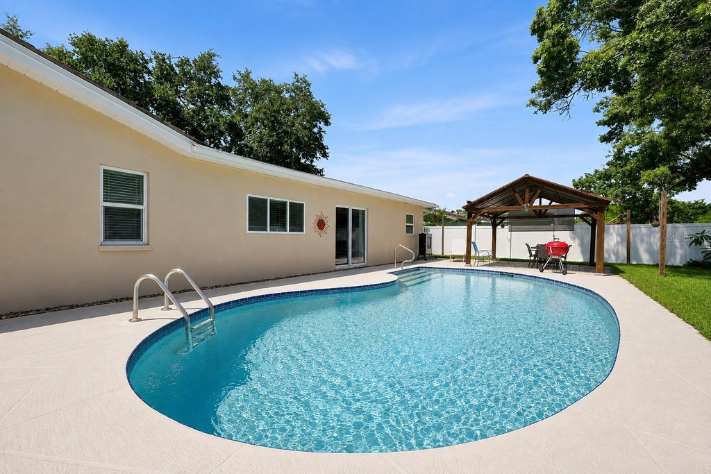 Photo of 2069 Kingfisher Drive, Palm Harbor, FL 34683 (MLS # TB8537740)