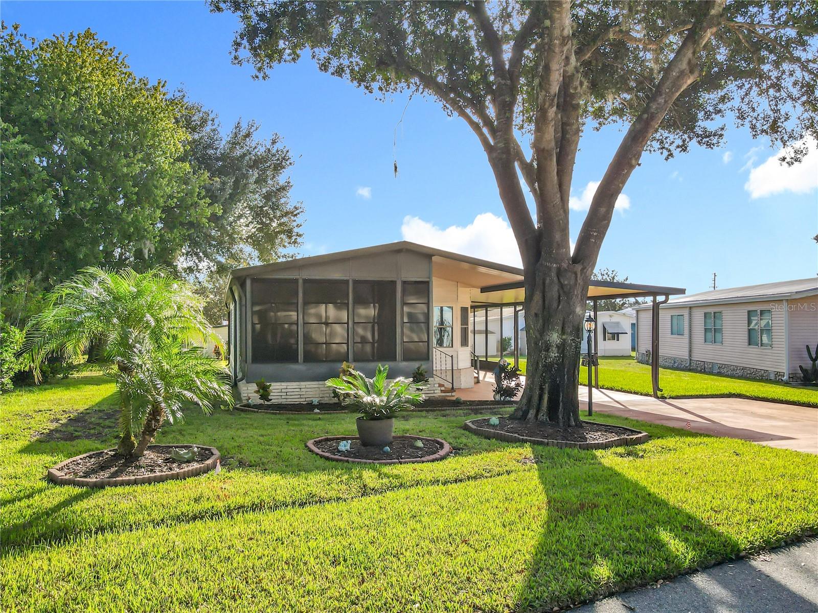 Wonderful opportunity to acquire a nicely maintained 2 bed, 2 bath property in the ever popular 55+ golf community of Polo Park West!! The home features a well designed open floorplan plus an 11.6 x 13.8 Florida room and also a shed/workshop. Extremely spacious driveway offers a 2 car carport plus room for a further 2 cars and a golf cart!! The home has been replumbed and benefits from new flooring, new storm windows, new landscaping and its own IRRIGATION WELL!! Polo Park offers many activities and amenities including 2 pools, 2 clubhouses, tennis & pickleball courts, horseshoes, and fitness center. All for the low HOA fees of $60 per month! The wonderful community enjoys a great location directly off Hwy 27, minutes from 192 and easy access to to I-4, theme parks, grocery stores, medical facilities, restaurants, shopping, Margaritaville and more...DON'T MISS OUT! Ask your agent to schedule a viewing today!