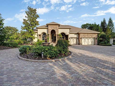 Photo of 11471 Trotting Down Drive, Odessa, FL 33556 (MLS # TB8528173)